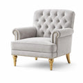 Poltrona in velluto grigio chiaro con gambe in legno dorato